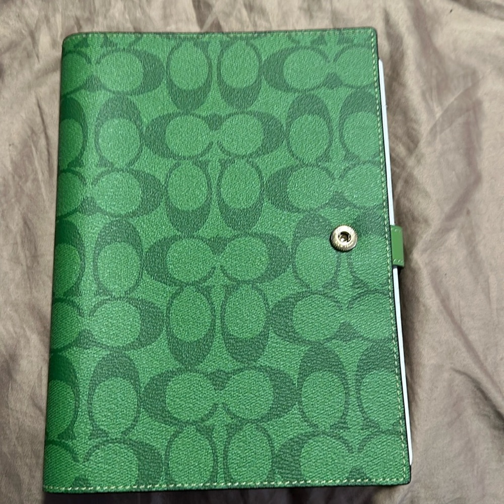 NWT Coach notebook